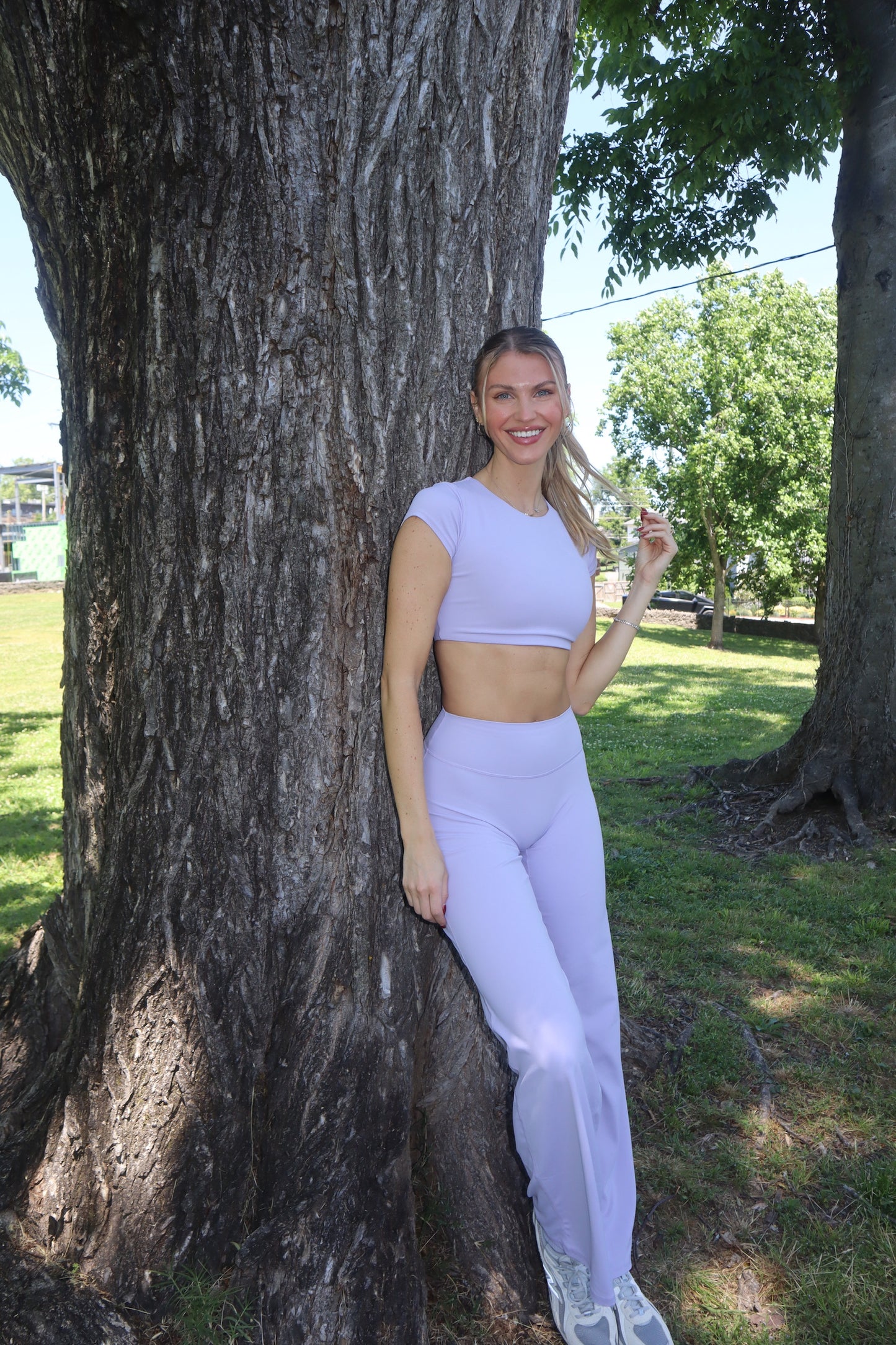 women in purple workout set