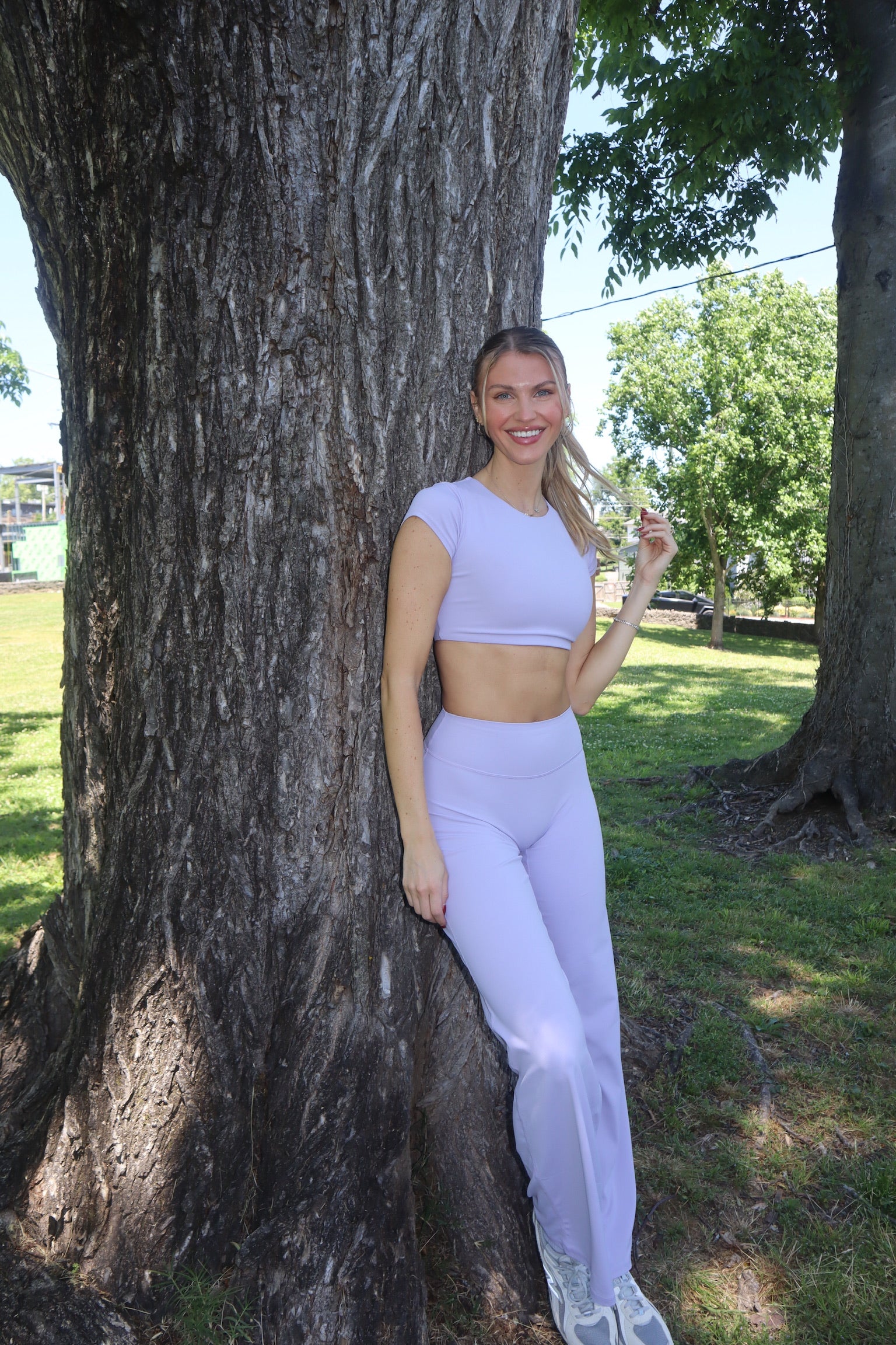 women in purple workout set